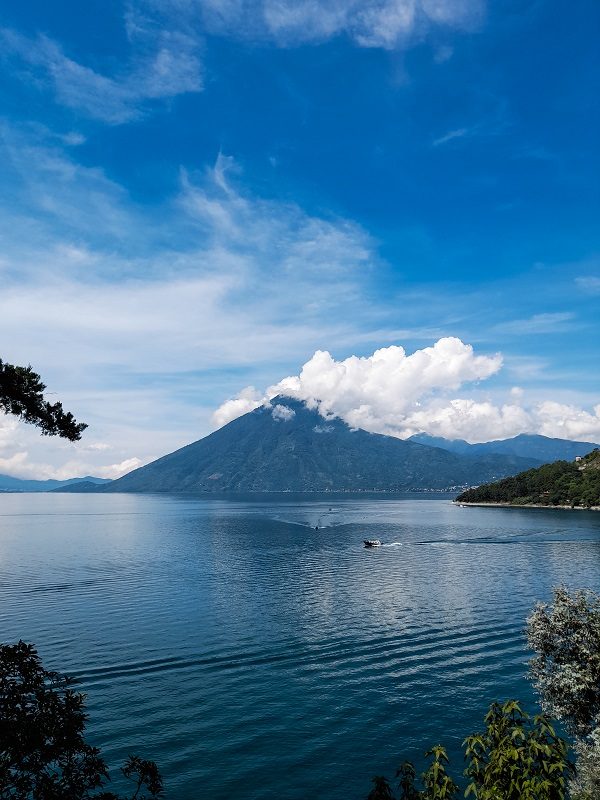 A vertical shot of Lake Atitlan with San Pedro Volcano background in  Guatemala, Central America